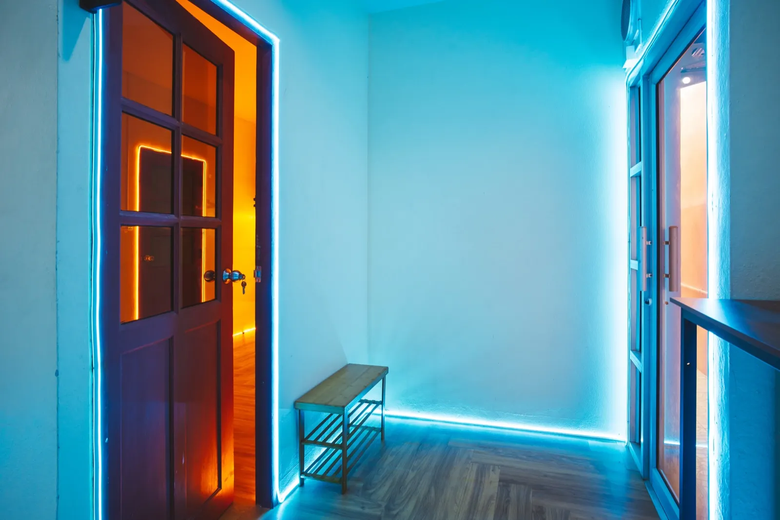 Neon-lit corridor to the dorms at The Hub Laidback Hostel, Ao Nang Beach