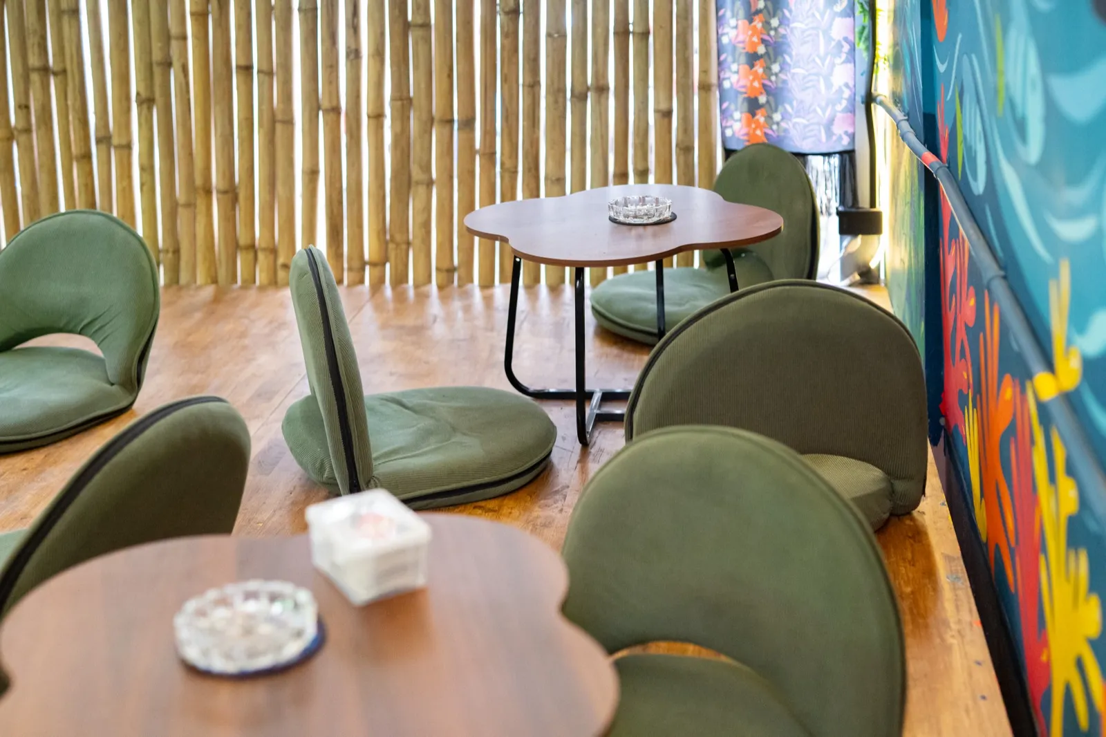 Floor-cushion chill lounge at the on-site weed shop, The Hub Laidback Hostel Ao Nang